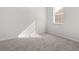 Neutral carpeted bedroom with a window and great light at 913 Sundown Pt, Villa Rica, GA 30180