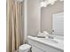 Bathroom featuring a white cabinet with a sink, toilet and tub with shower at 165 Winner St, Acworth, GA 30102