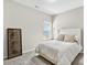 Bedroom featuring a window, gray carpet, and a white bed and headboard at 165 Winner St, Acworth, GA 30102