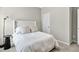 Cozy bedroom with neutral tones, plush carpeting, and a comfortable queen-sized bed at 165 Winner St, Acworth, GA 30102