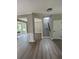 Welcoming entryway featuring sleek floors and access to a staircase, complemented by neutral wall colors at 2147 Saint Albans Pl, Buford, GA 30519
