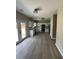 Spacious kitchen with stainless steel appliances, white cabinetry, and hardwood floors at 2147 Saint Albans Pl, Buford, GA 30519