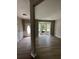 Inviting living room showcasing bright natural light from the window, complemented by neutral flooring at 2147 Saint Albans Pl, Buford, GA 30519