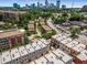 Aerial shot showcasing community, surrounding greenery, and skyline views at 304 Stonemont Dr, Atlanta, GA 30305