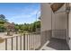 Balcony with metal railing offering neighborhood views at 304 Stonemont Dr, Atlanta, GA 30305