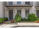 Welcoming townhome entrance with meticulously landscaped front yard at 304 Stonemont Dr, Atlanta, GA 30305