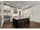Modern kitchen with stainless steel appliances, island, and stylish pendant lights at 304 Stonemont Dr, Atlanta, GA 30305