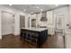 Spacious kitchen with a large island, stainless steel appliances, and pendant lighting at 304 Stonemont Dr, Atlanta, GA 30305
