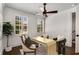 Modern office with desk, fan, and dark hardwood floors at 304 Stonemont Dr, Atlanta, GA 30305