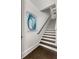 Stylish staircase with hardwood floors and elegant decor at 304 Stonemont Dr, Atlanta, GA 30305