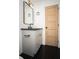 Stylish bathroom with black and white tile, modern vanity, and brushed gold hardware at 3200 Lowndes St, East Point, GA 30344