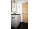 Modern bathroom featuring black and gold accents, sleek fixtures, and a stylish vanity at 3200 Lowndes St, East Point, GA 30344