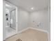Modern bathroom with a glass-enclosed shower and a clean, minimalist design at 656 S Elizabeth Nw Pl, Atlanta, GA 30318