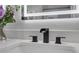 Close-up of a modern sink with a sleek black faucet at 656 S Elizabeth Nw Pl, Atlanta, GA 30318
