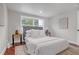 Bright bedroom featuring a neutral palette, plush bedding, and large windows that offers lots of natural light at 656 S Elizabeth Nw Pl, Atlanta, GA 30318