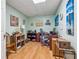 Well-lit home office featuring wood floors, nautical decorations, a computer desk, and ample storage space at 672 Victorian Cir, Dallas, GA 30157