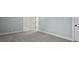 Neutral bedroom features multiple doors and plush carpeting at 2208 Sage Mountain Sw Ct, Marietta, GA 30064