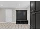 Mud room with coat rack, seat and storage, as well as cabinets and a patterned floor at 230 Thistlewood Ln, Roswell, GA 30075