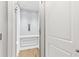 Interior elevator shows the elevator car with white trim and a control panel at 4486 Huffman Drive Ne Dr, Roswell, GA 30075