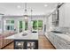 Bright open kitchen with large island, stainless appliances, and lots of windows at 4486 Huffman Drive Ne Dr, Roswell, GA 30075