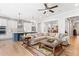 Open floorplan with hardwood floors connecting living room with modern island kitchen at 4486 Huffman Drive Ne Dr, Roswell, GA 30075