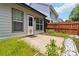 Fenced backyard with concrete patio and some landscaping, offering outdoor space at 1269 Gates Se Cir, Atlanta, GA 30316