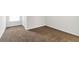 Bedroom features neutral carpet, white walls, and ample natural light from the window at 1269 Gates Se Cir, Atlanta, GA 30316