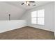 Upstairs carpeted room with a ceiling fan and natural light at 1269 Gates Se Cir, Atlanta, GA 30316