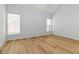 Spacious bedroom featuring hardwood floors and two windows for natural light at 1269 Gates Se Cir, Atlanta, GA 30316