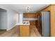 Stylish kitchen with wood cabinets, stainless steel appliances, and modern lighting at 1269 Gates Se Cir, Atlanta, GA 30316