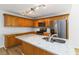 Modern kitchen featuring stainless steel appliances, an island with sink, and wooden cabinetry at 1269 Gates Se Cir, Atlanta, GA 30316