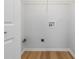 Laundry room with connections for washer and dryer and wire shelving for storage at 1269 Gates Se Cir, Atlanta, GA 30316