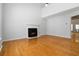 Bright living room with hardwood floors, a fireplace, and an open layout at 1269 Gates Se Cir, Atlanta, GA 30316