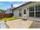 Back patio with a view of the fenced yard, perfect for outdoor entertaining at 1269 Gates Se Cir, Atlanta, GA 30316