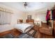 Comfortable bedroom with hardwood floors, neutral walls and comfy armchair at 2581 N Clark Dr, Atlanta, GA 30344