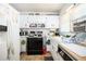 Well-lit kitchen showcasing ample cabinet space and essential appliances at 2581 N Clark Dr, Atlanta, GA 30344