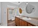 Bathroom featuring a double sink vanity and decorative pendant lighting at 4138 Hickory Dr, Powder Springs, GA 30127