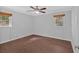 Bedroom with neutral colors, modern flooring, and dual windows at 4138 Hickory Dr, Powder Springs, GA 30127