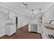 Gourmet kitchen featuring modern appliances, granite countertops, and ample storage space flowing into the living area at 4138 Hickory Dr, Powder Springs, GA 30127