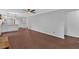 Open-concept living room flowing into kitchen area, with modern flooring and ample space at 4138 Hickory Dr, Powder Springs, GA 30127