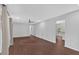 Open-concept living area with hardwood floors and abundant natural light, perfect for entertaining and relaxation at 4138 Hickory Dr, Powder Springs, GA 30127