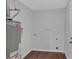 Neutral utility room with a water heater, outlets, and a light-colored wall at 4138 Hickory Dr, Powder Springs, GA 30127