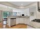 Bright kitchen showcasing stone countertops, stainless appliances, and a breakfast nook with natural light at 4140 Prince Charles Dr, Duluth, GA 30097
