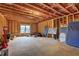 Spacious unfinished basement awaiting customization, ample storage, and natural light at 5540 Wood Falls Dr, Buford, GA 30518