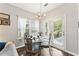 Cozy dining area with large windows and a glass table at , Conyers, GA 30012
