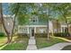 Charming two-story home with green siding and stone accents at , Conyers, GA 30012