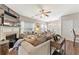 Open-concept living area featuring hardwood floors, a fireplace, and stylish decor at , Conyers, GA 30012