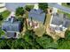 Aerial view of a home with a patio and backyard, nestled among other well-kept houses at 213 Roseman Way, Woodstock, GA 30188