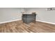 A view of a basement bar area featuring hardwood floors at 213 Roseman Way, Woodstock, GA 30188