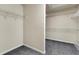 Walk-in closet with carpet and wire shelving for organization and storage at 213 Roseman Way, Woodstock, GA 30188